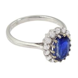 18ct white gold oval cut kyanite and round brilliant cut diamond cluster ring, stamped, kyanite 1.77 carat, total diamond weight 0.52 carat, with World Gemological Institute report