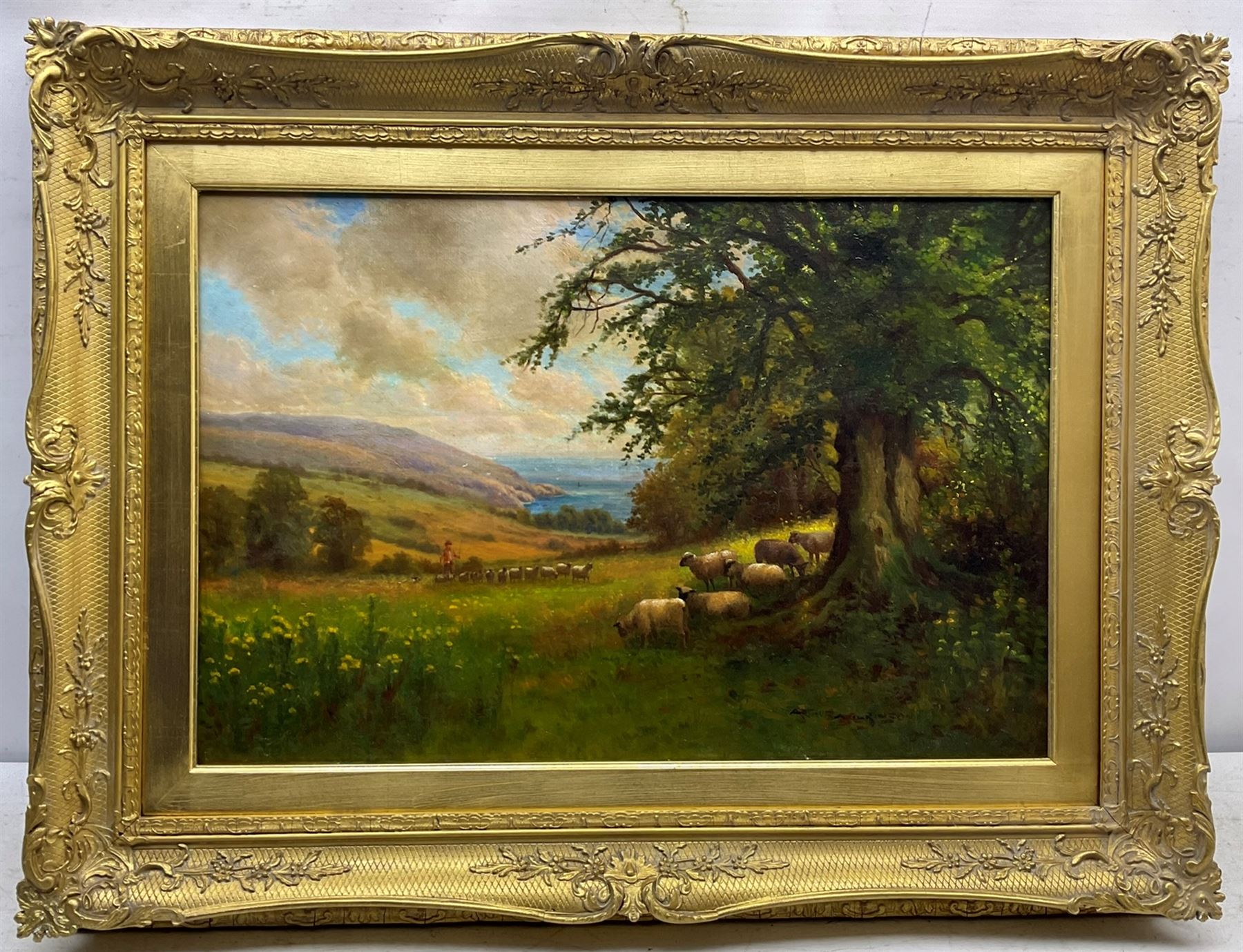 Arthur Stanley Wilkinson (British 1860-1930): 'Devonshire Pastures by the Sea near Clovelly', oil on canvas signed, original title label verso 40cm x 60cm