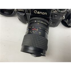 Canon A1 35mm camera body serial no 741264, with 'Tokina AT-X 28-85mm 1:3.5-4.5' lens serial no 821679, 'Canon FD 50mm 1:1.8mm' lens and other camera equipment 