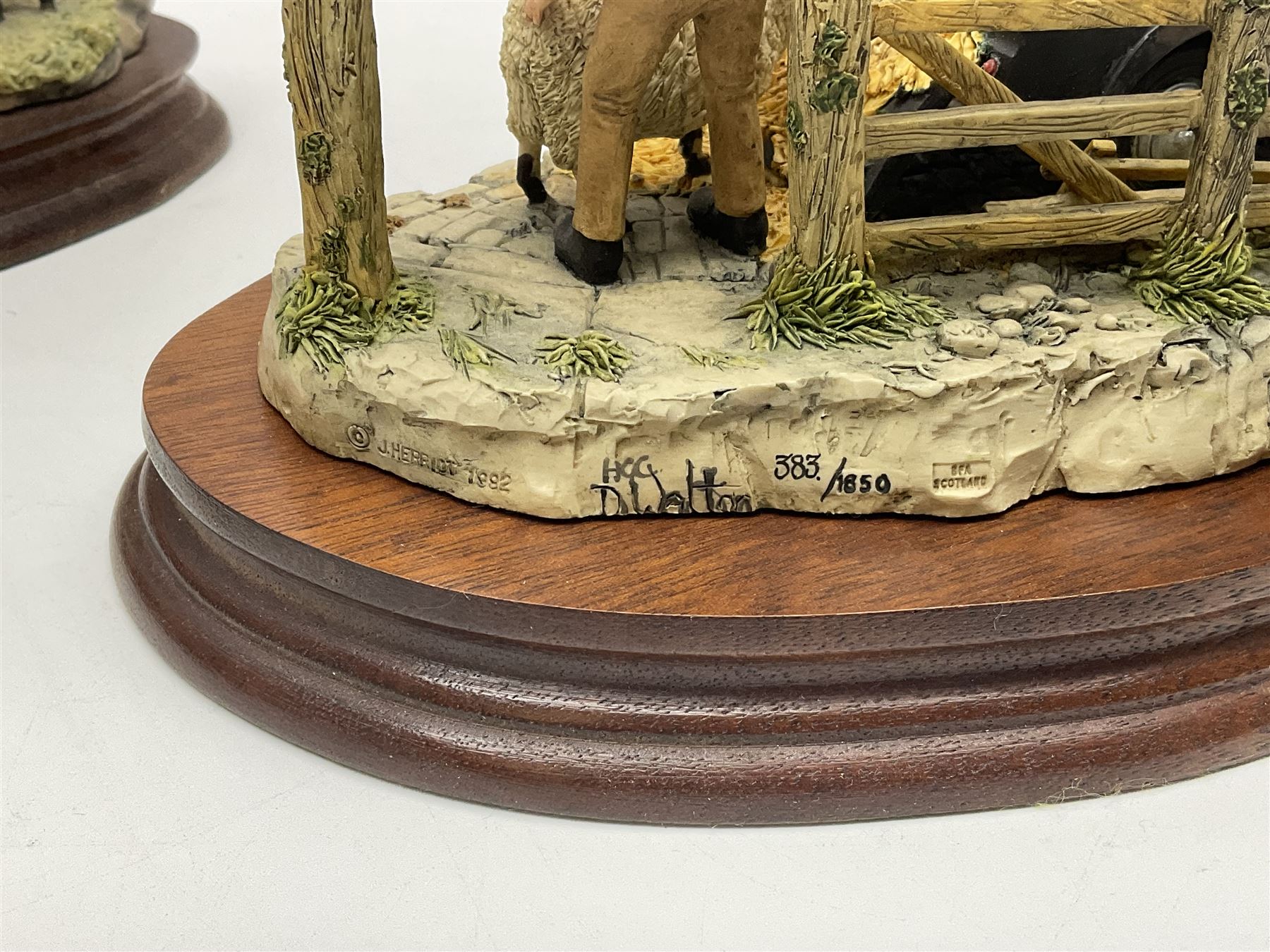 Two Border Fine Arts figure groups, comprising Black faced Ewe & Border Collie no B104 by Ray Ayres and To The Tup Sale, no JH72 limited edition 383/1850, both on wooden base, one with certificate
