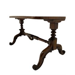 19th century and later stretcher coffee table, the rectangular top with figured and quarter walnut veneer, on two pillar supports joined by turned and carved stretcher, on splayed and scroll carved supports