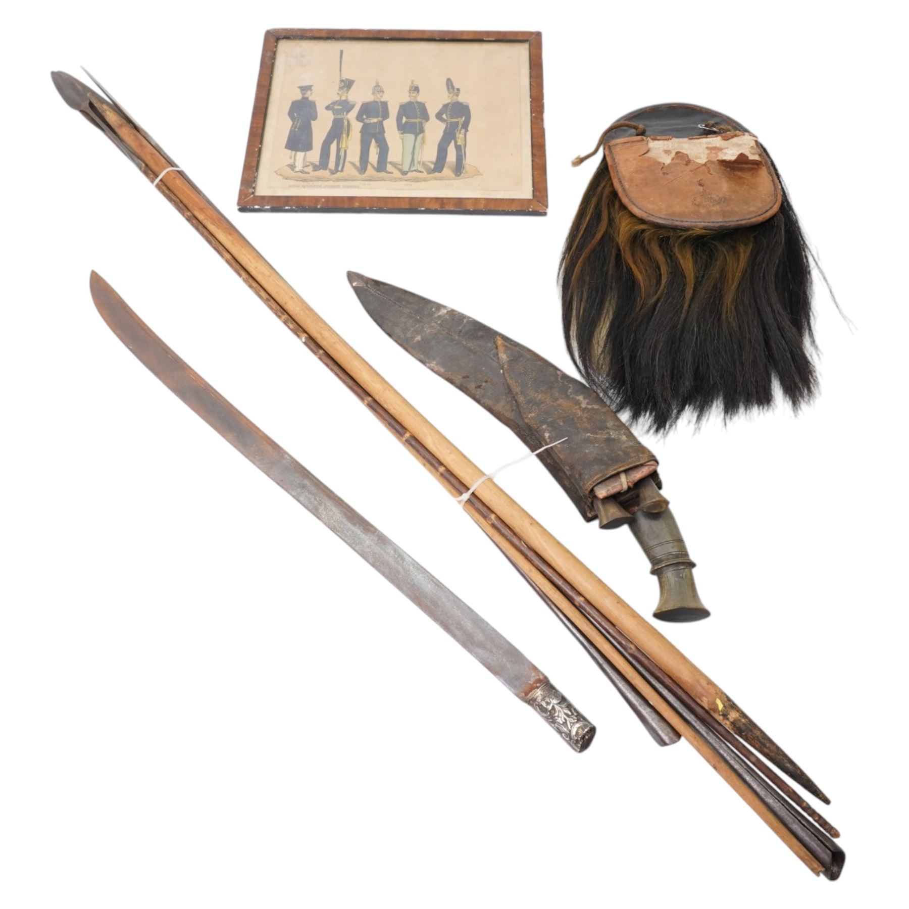 Nepalese kukri with skinning knives in leather scabbard, horse hair and leather sporran by Leckie Graham & Co 1900, Burmese sword, African spears and a military print