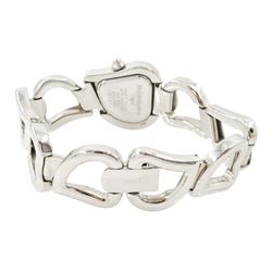 Two Yves Saint Laurent ladies stainless steel quartz wristwatches including 'Moon Phase' with gold plated bracelet, no. 284717, the other with heart shaped face and bracelet links, no. 7N0336