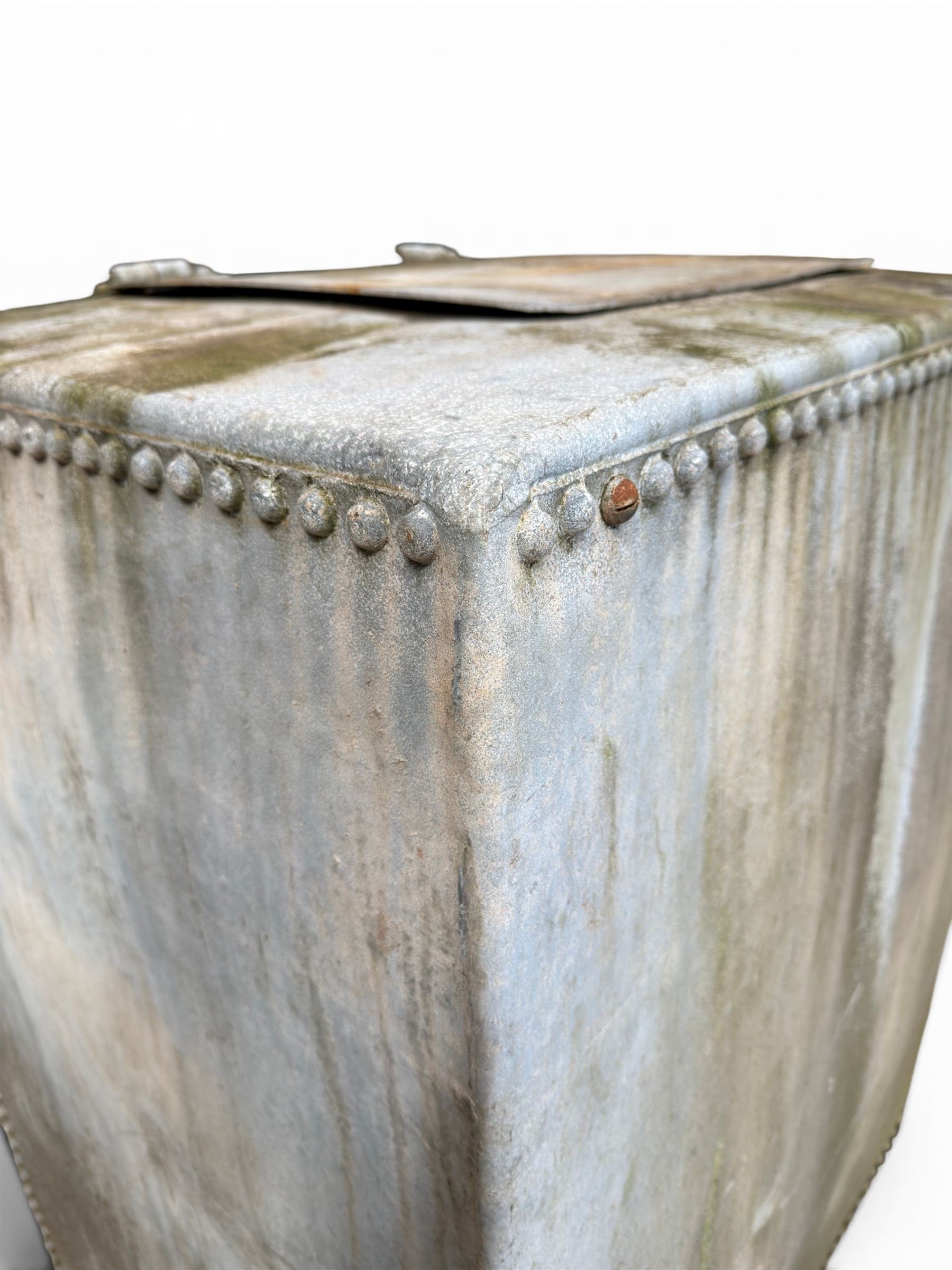 Large early 20th century galvanised water, cube form  with rounded corners and buttoned detail, with tap