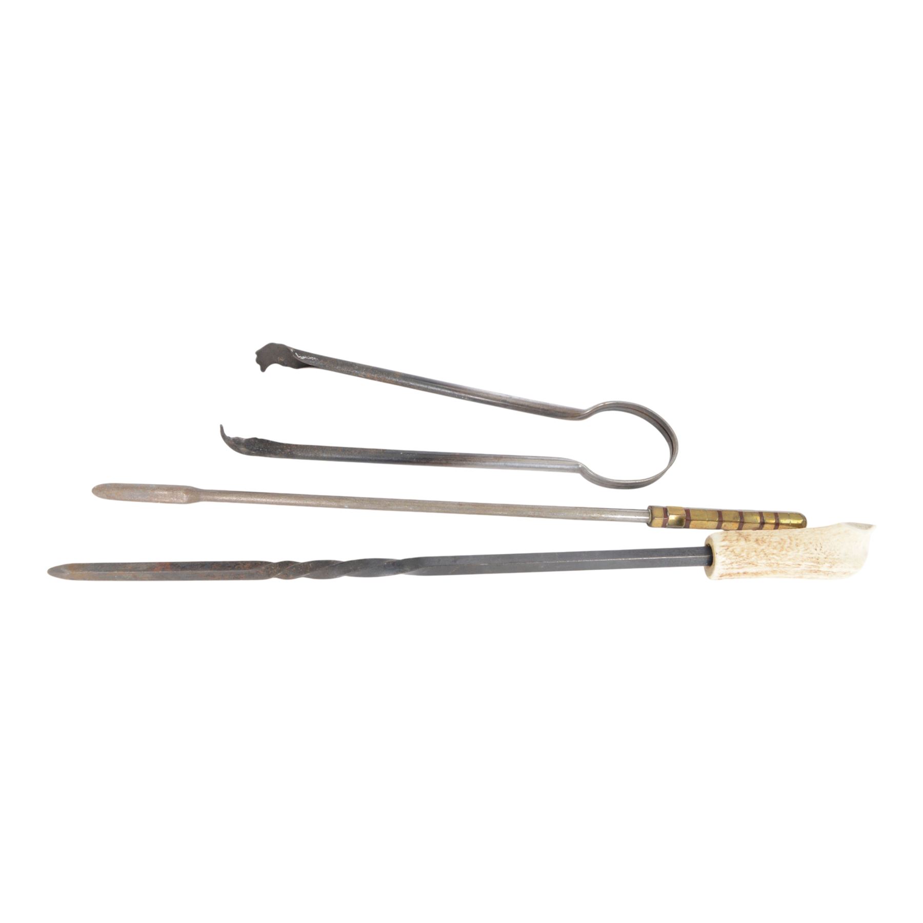 Artillery shell case, together with fireside tools and carved wooden dagger 