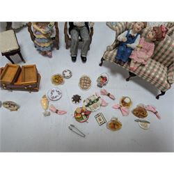 Dolls house drawing room furniture, including dressers, pink and green checked sofa and armchairs, bureau, chairs, piano, eight figures and a collection of afternoon tea miniatures
