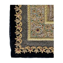 20th century large Zardozi wall hanging, hand embroidered in gold thread on black velvet ground with semi-precious stones and central medallion  149x93cm