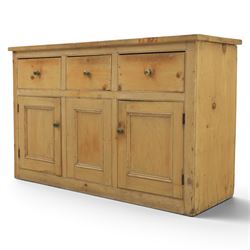 Victorian pine dresser base, with rectangular plank top, above three short drawers over two cupboard doors