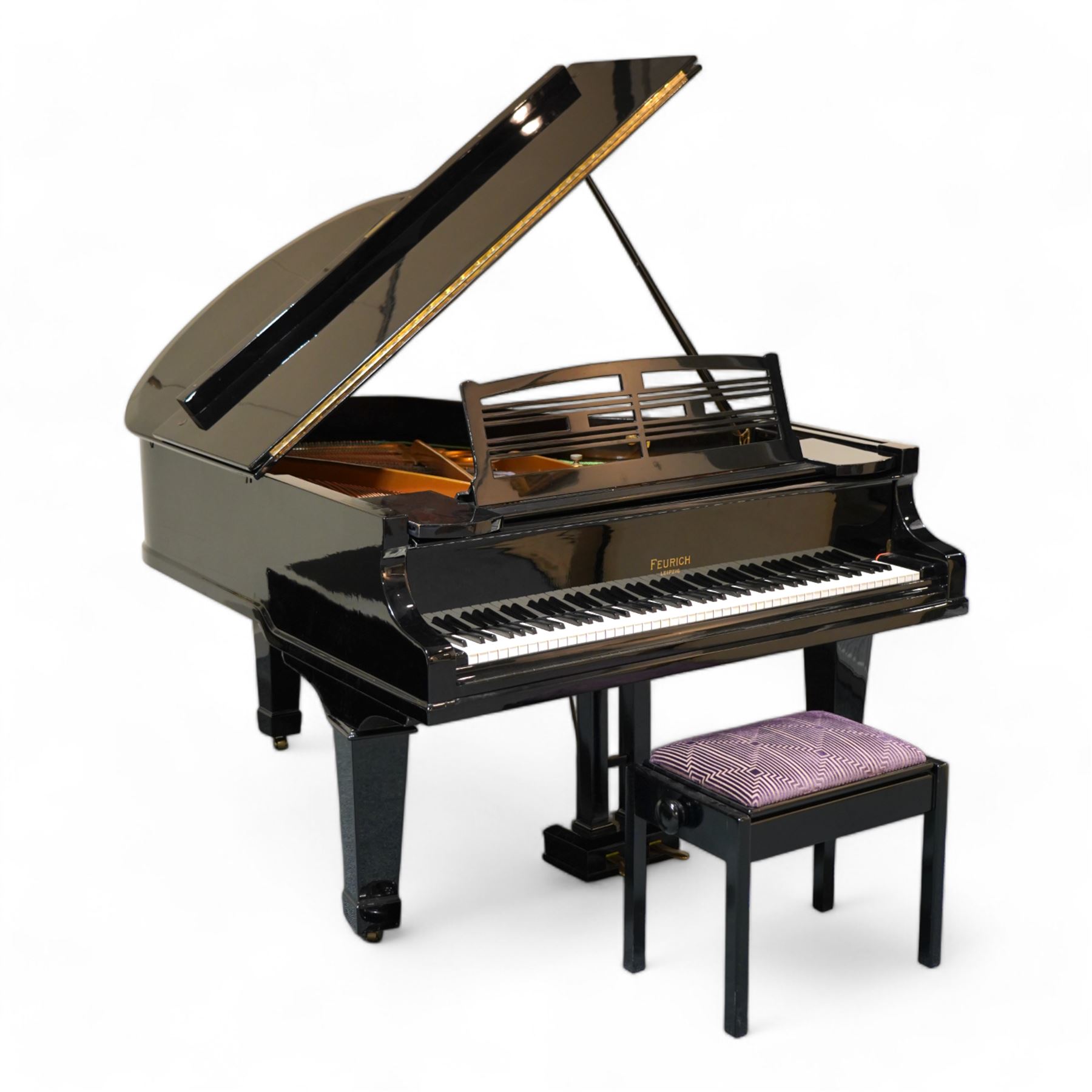 Feurich of Leipzig - German overstrung medium grand piano in a black lacquered case, with a seven octave M&K of Leipzig roller action keyboard, original strings and tuning pins, new hammer heads and dampers, with sostenuto and sustain pedals, adjustable music desk and matching adjustable stool.