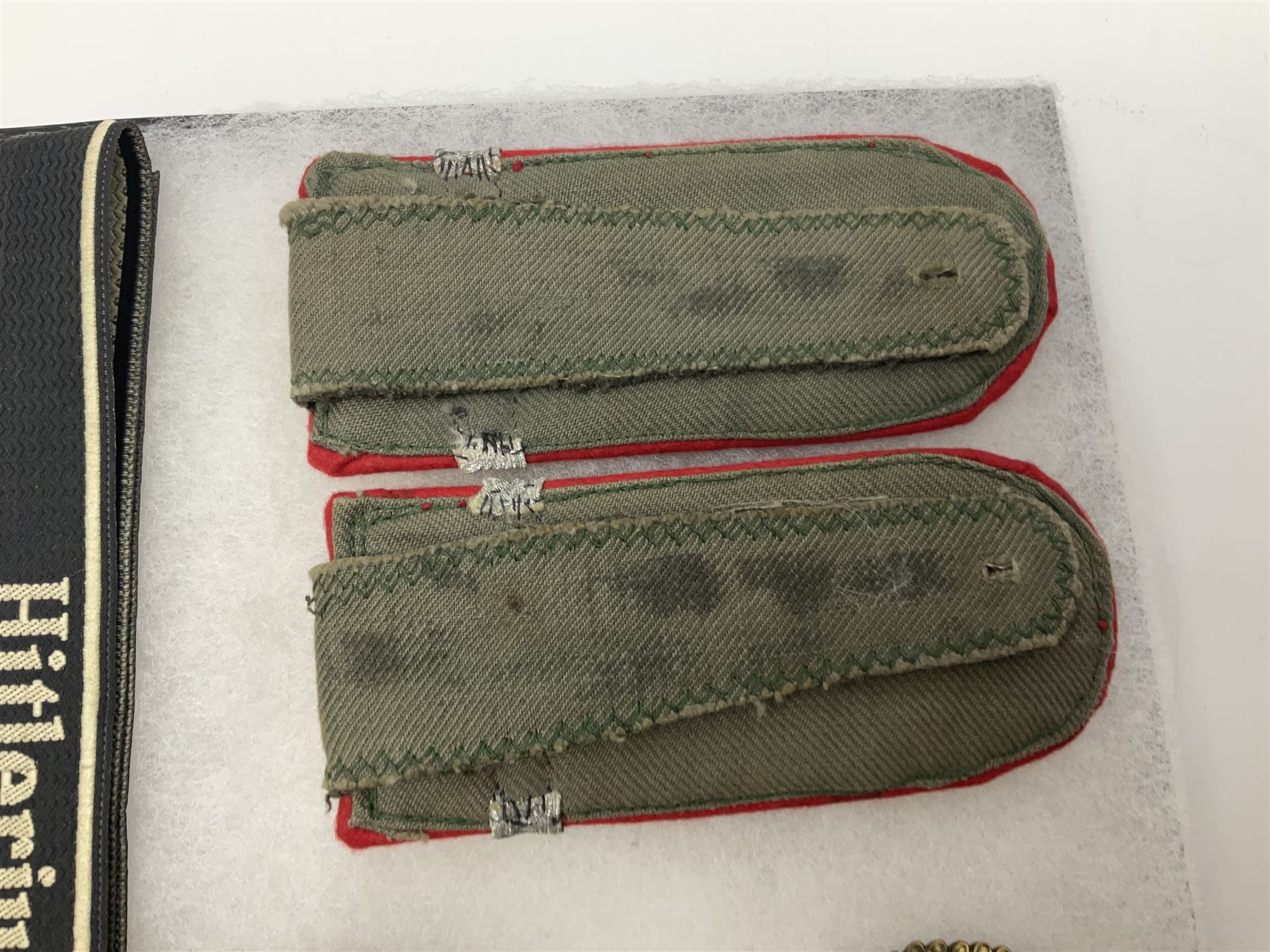 WW2 German Don Cossack epaulettes; and quantity of German insignia including SA Sports Badge for war wounded, Hitler Youth badge, Young Cossacks badge, Wound badge, Hitler Youth cuff title etc; in glass topped display box.