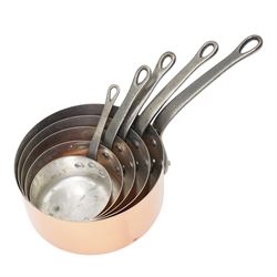 Set of five French copper graduating saucepans with iron handles, stamped Les Cuivres de Faucoeney, max D18cm