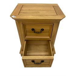 Small light oak two drawer pedestal chest