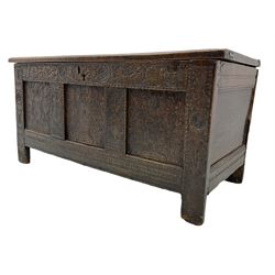 18th century carved oak coffer, tripe panel front and hinged lid