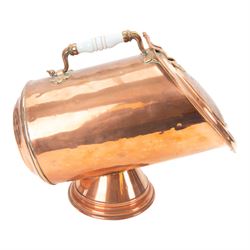 Pair of 19th century copper coal scuttles, of circular form raised on a circular stepped foot with hinged cover, H44cm, L50cm