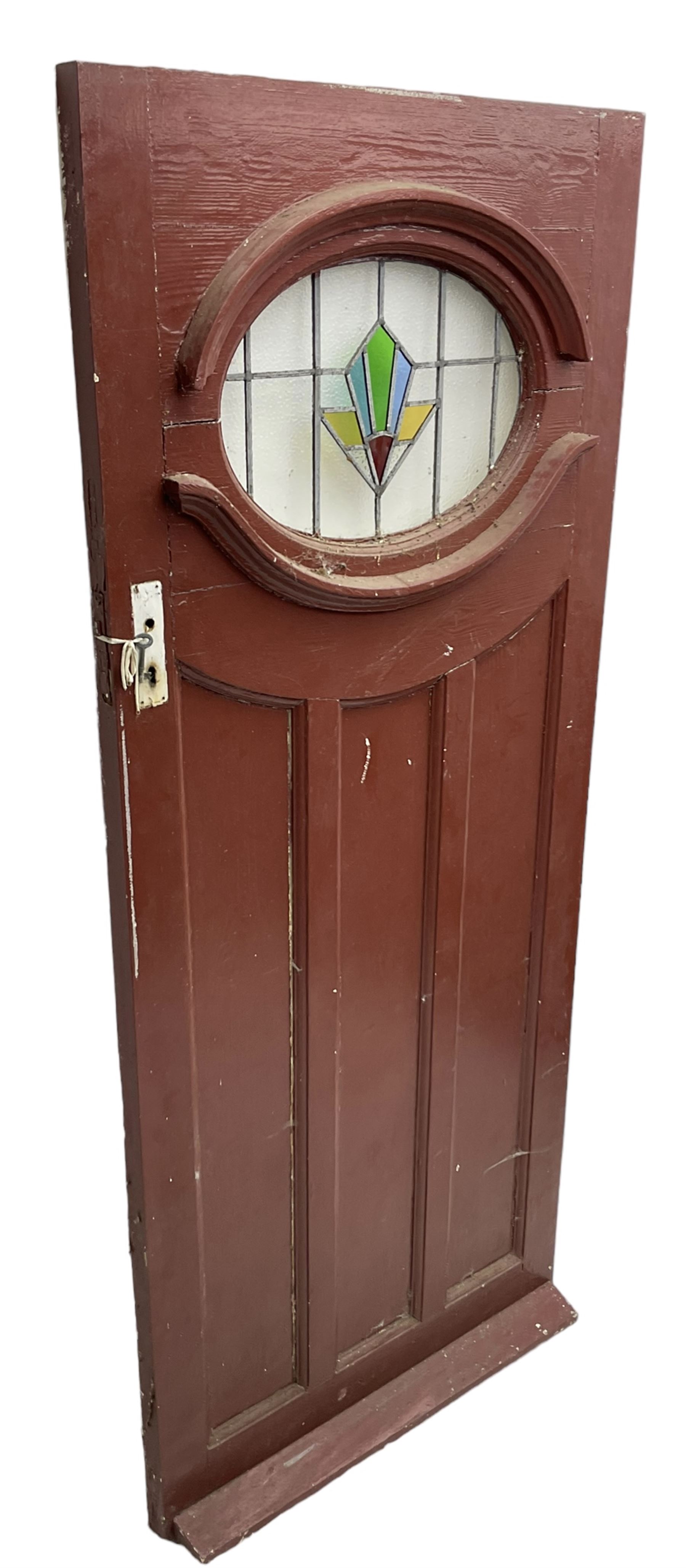 1930s external door with stained leaded glass panel (86cm x 203cm), six small stained glass windows in wooden frames (W52cm); and various loose stained leaded glass panels