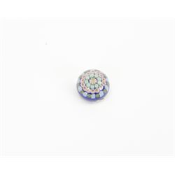 Nine miniature milleifiori paperweights including an example with twisted canes 