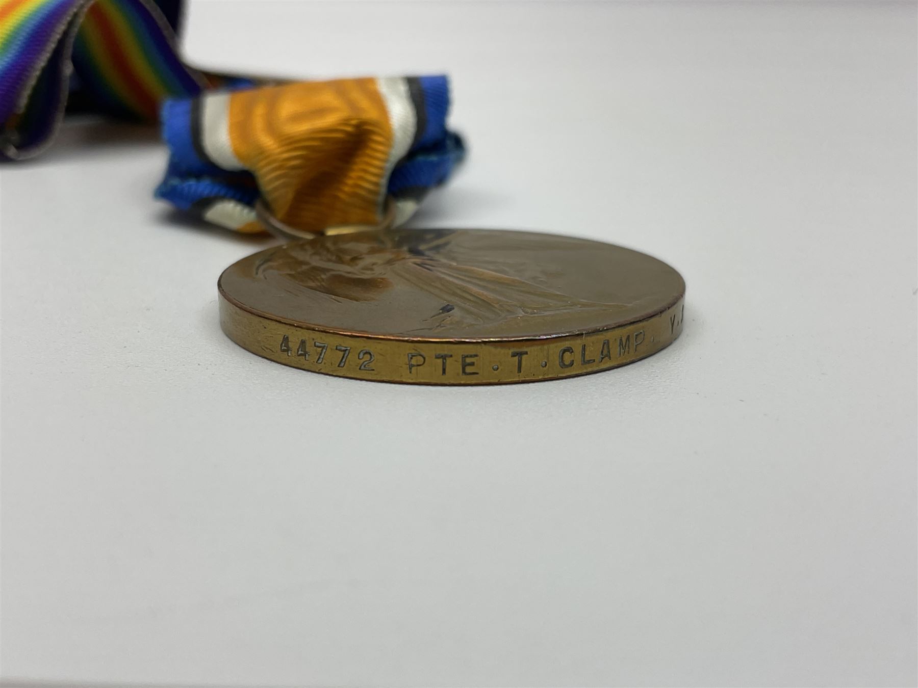 WW1 Military Medal group of three comprising MM, British War Medal and Victory Medal awarded to 44772 Pte. T. Clamp 5/York: & Lanc: R.; all with ribbons on hanging bar