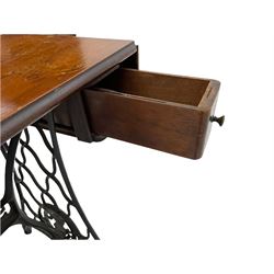 Singer - walnut and cast iron treadle sewing machine