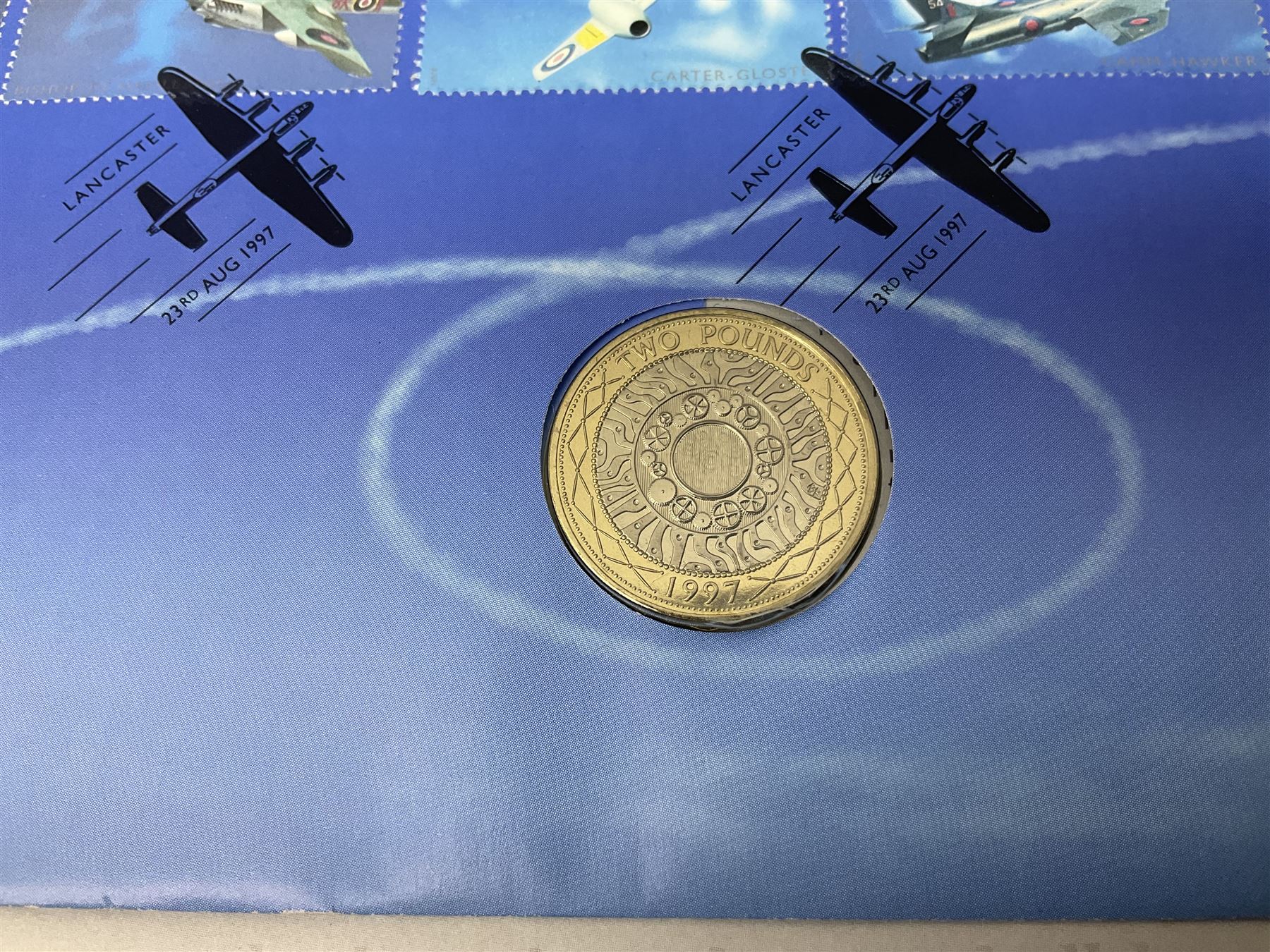 Seven The Royal Mint Royal Mail two pound coin covers, including 1999 'Rugby World Cup', 2003 'DNA Discoveries', 2004 'Classic Locomotives', 2007 '300th Anniversary of the Act of Union' etc