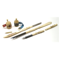 Two Victorian bone Stanhope pens with letter opener terminals, together with two further bone Stanhope pens (a/f), and two Victorian vegetable ivory Stanhope barrel tape measures. 