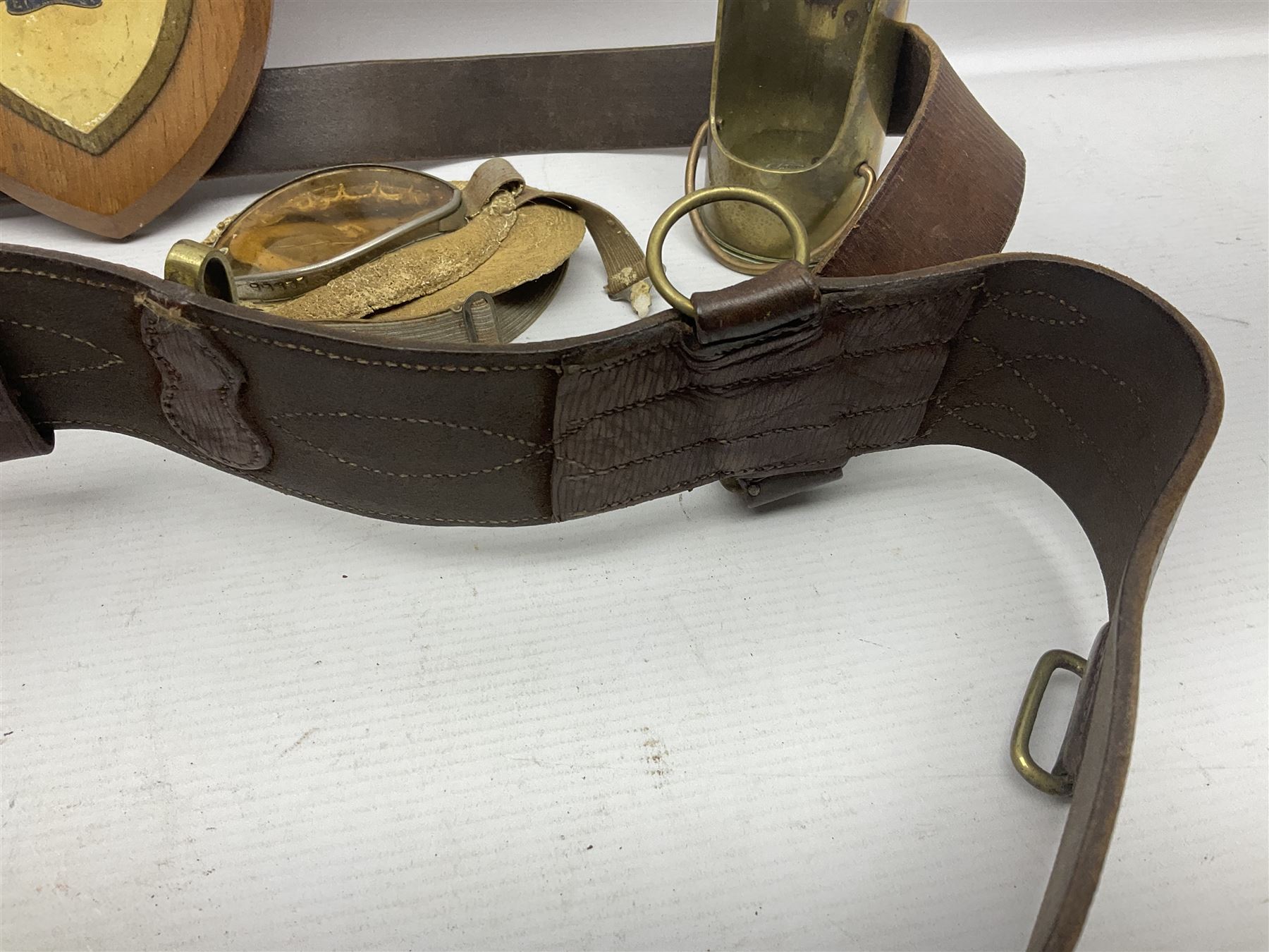 British Army Sam Brown leather belt with Turkish markings; New Zealand Land Forces officer's commission certificate dated 1919; WWII small pair of trench art brass helmet shaped scuttles; and other items