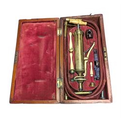 Vintage cased medical pump with bone handles 