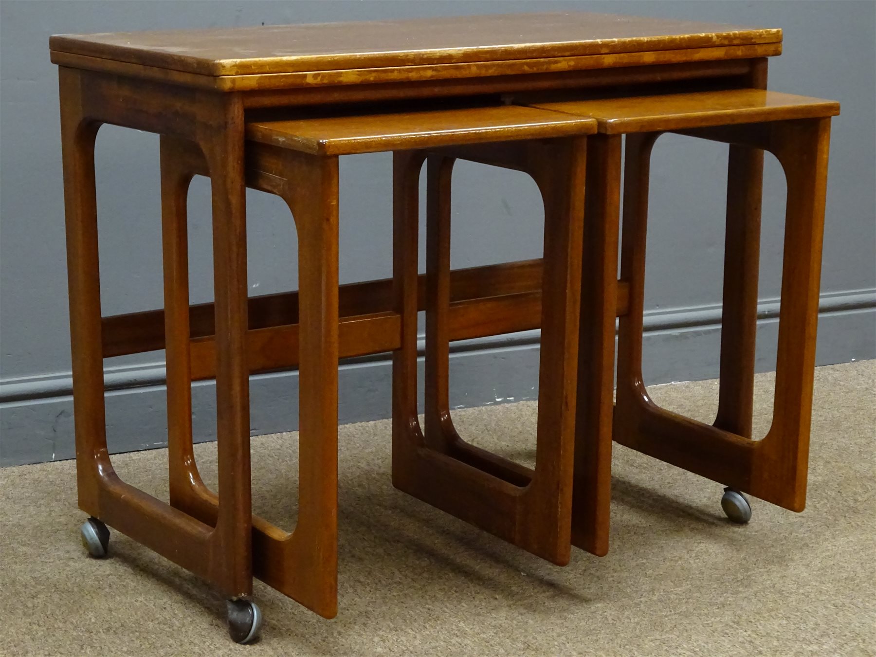 Mackintosh teak nest of tables, folding rectangular top, two nesting