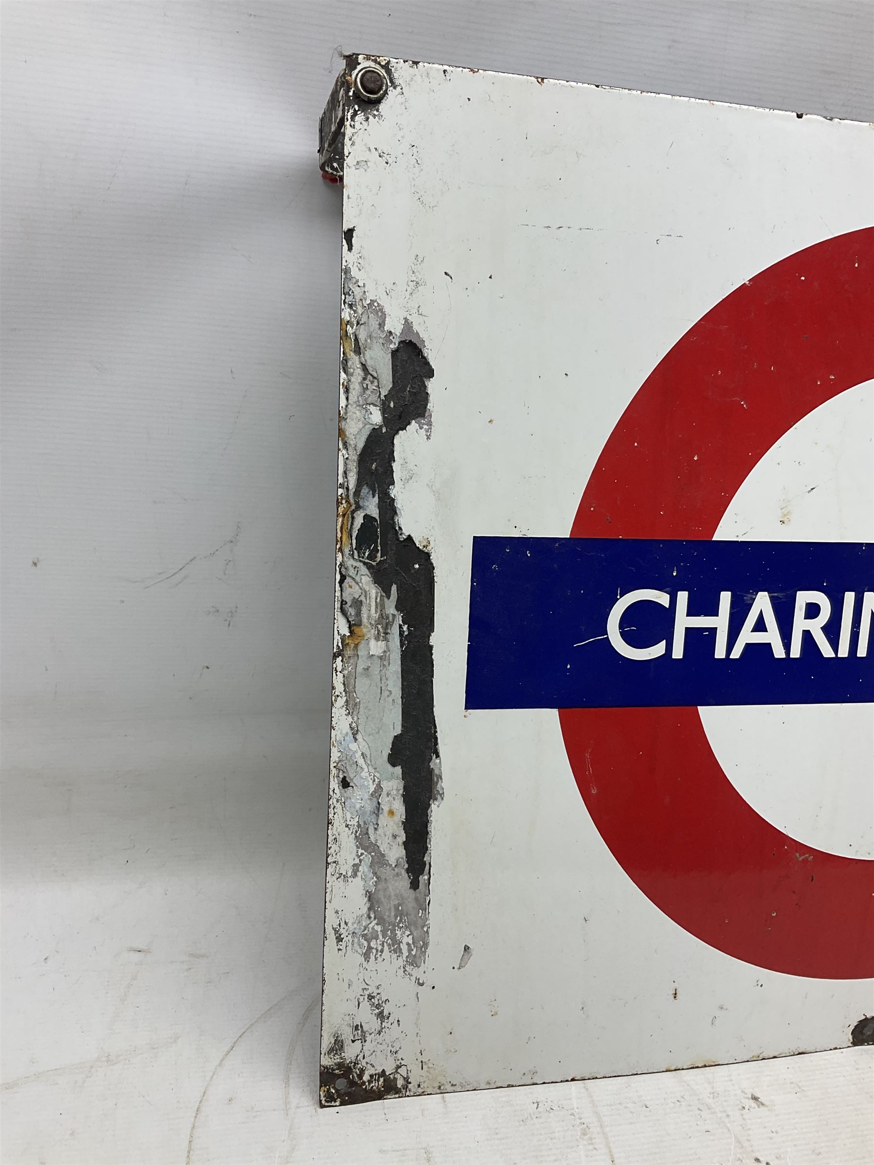 Enamel station sign for Charing Cross in red and blue on a white ground 56 x 71cm with hanging brackets