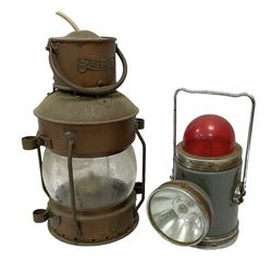 Ship's copper and brass Anchor mounted lantern with caged clear glass lens, by Seahorse, together with a smaller light with carrying handle in grey finish