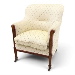 Edwardian inlaid mahogany armchair of modest proportions, spoonback and loose seat cushion...