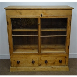  19th century pine cabinet two glazed doors, two shelves above two doors, W118cm, H123cm, D49cm  