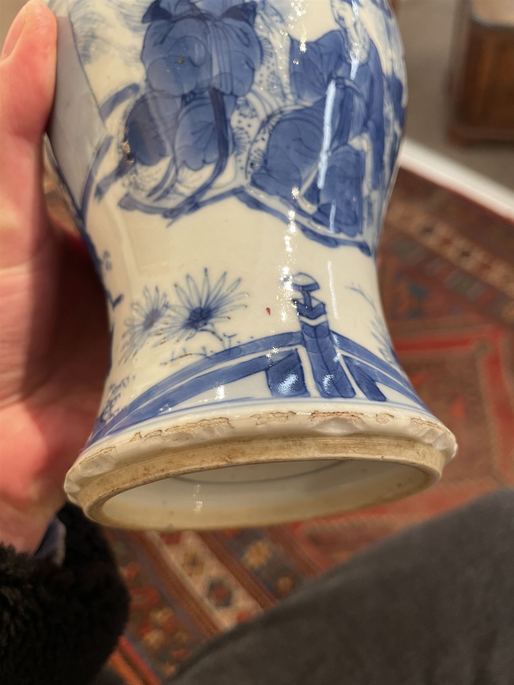 Chinese Kangxi porcelain vase, of baluster form painted in underglaze blue with seated figures and attendants, with fence, rockwork and leafy bamboo branches, with concentric circles mark beneath, H22.5cm