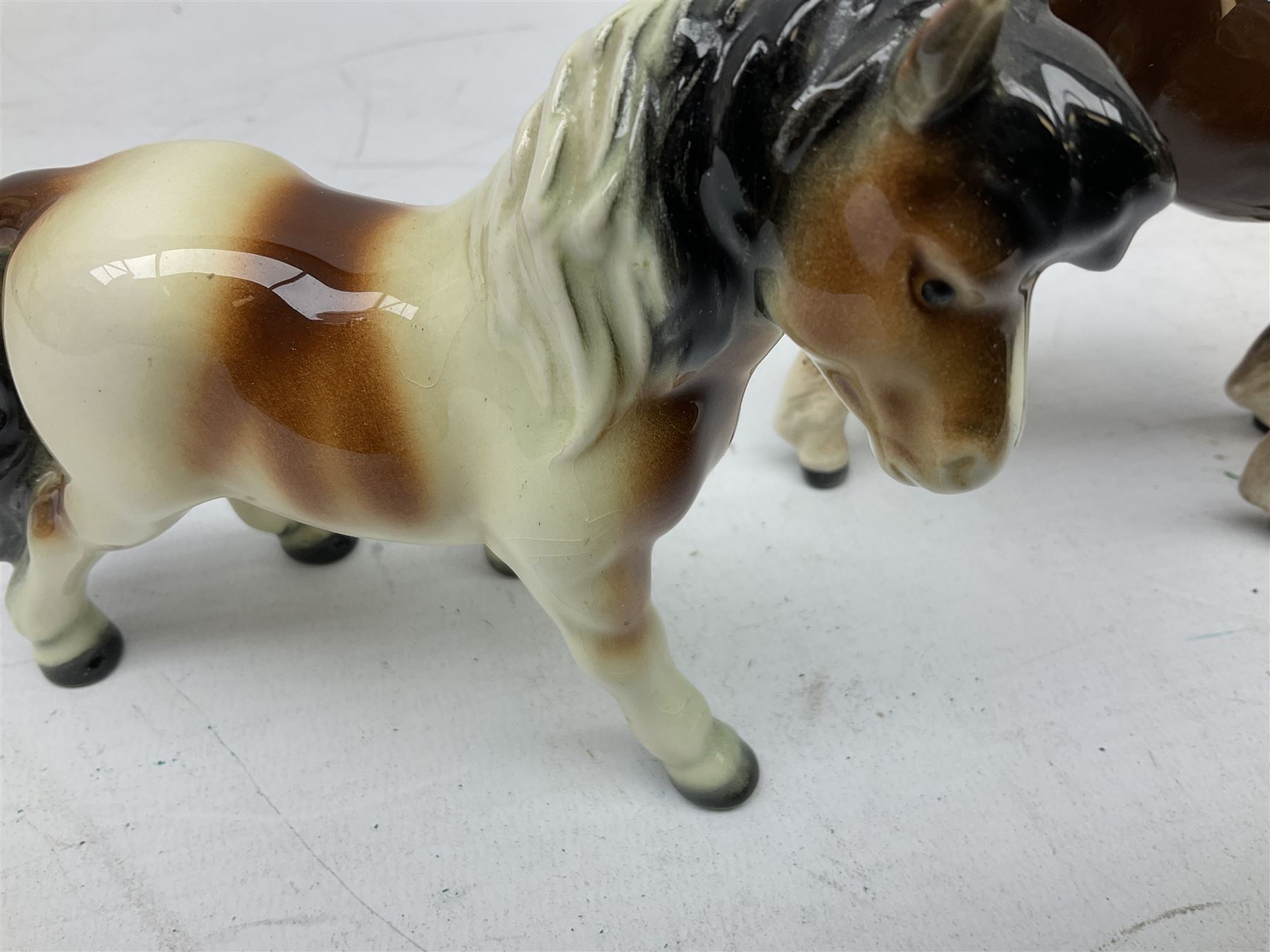 Seven Beswick figures of horses, including Connemara pony in grey no.1641, Arab in bay no.1265, large foal in grey no.947 etc, together with a Goebel figure of a horse (8)