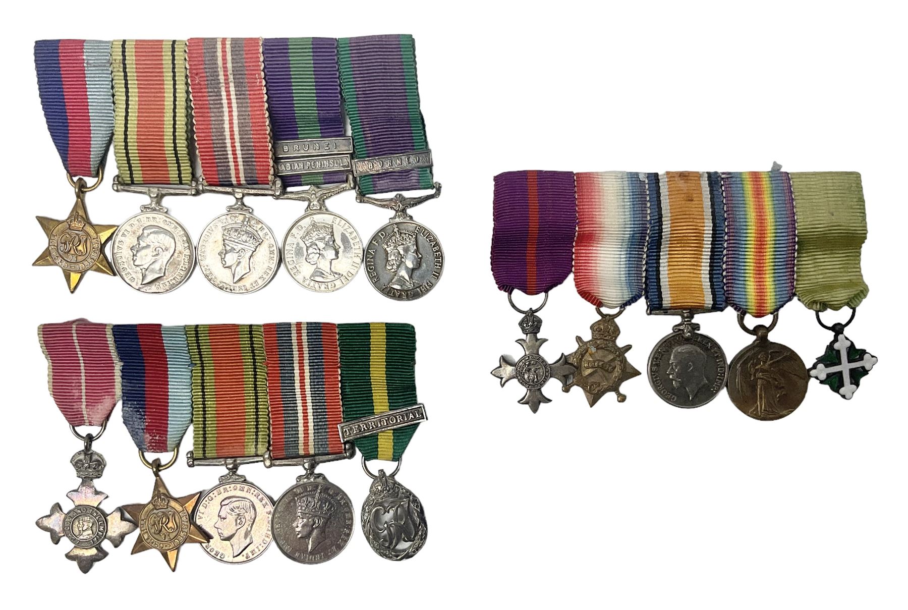 Three miniature groups of five medals - OBE Military group with WW1 trio and Italy Order of Saints Maurice & Lazarus Knights Cross; MBE Military group with WW2 trio and Territorial Efficiency Decoration; and WW2 trio, General Service Medal 1918-62 with Brunei and Arabian Peninsula clasps and GSM 1962 with Borneo clasp; all with ribbons on pinned wearing bars (3)