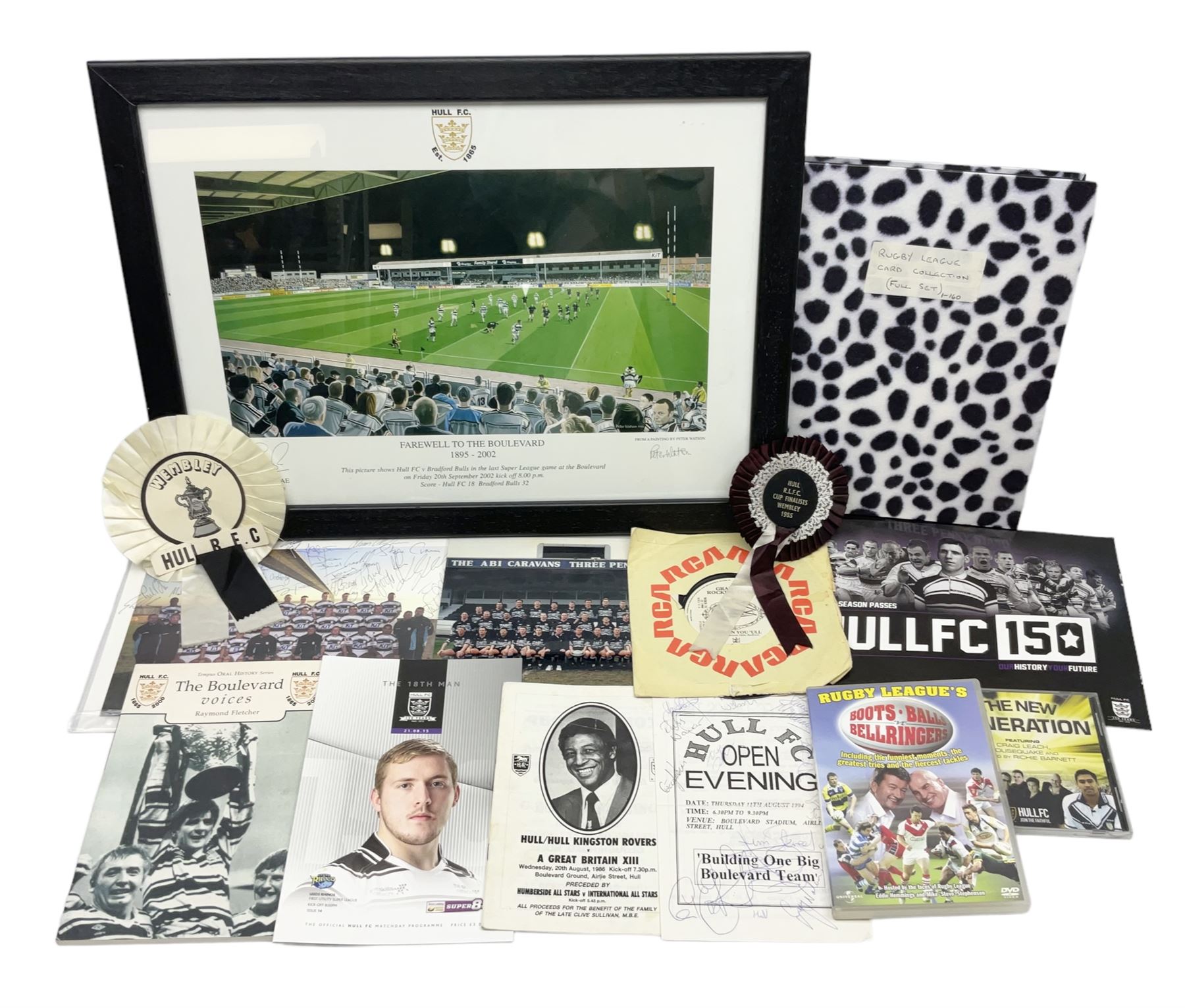 Hull F.C. memorabilia; Clive Sullivan 1986 memorial game programme, Open Evening 1994 programme with multiple player signatures, 'Old Faithful' 45rpm record, Wembley rosettes, 2000 team poster with facsimile signatures, framed print 'Farewell to the Boulevard 1895-2002', fully signed team photograph, various booklets, CD, DVD etc; and a folder containing the Merlin Rugby League card collection