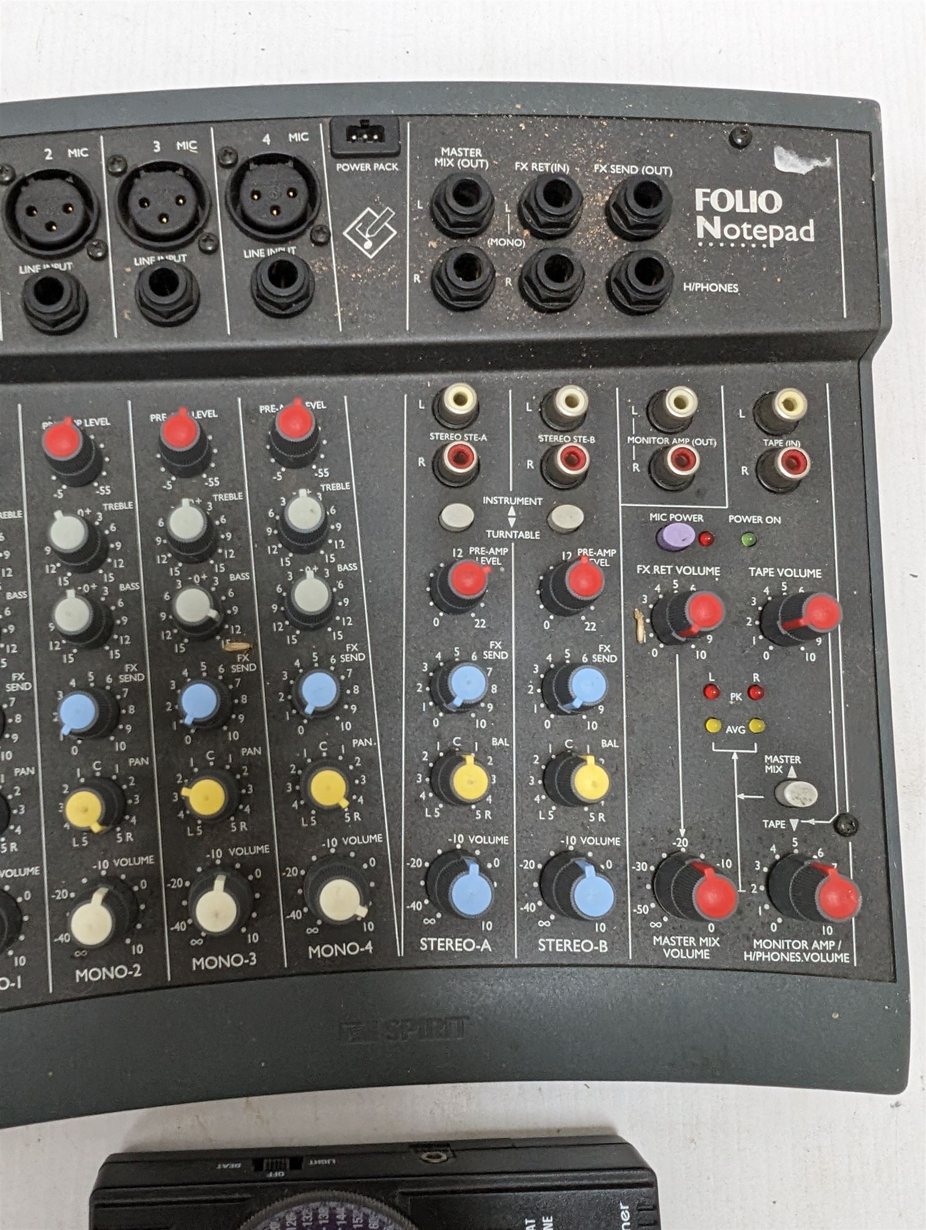 Spirit Folio Notepad mixer, together with a Roland pedal and a Suntech metronome tuner