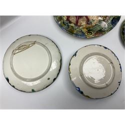 Five 20th Century Portuguese Palissy style Majolica wall plates, all depicting crustaceans to the centre modelled in relief surrounded by encrustations and shells, both with impress marks beneath, largest D29cm