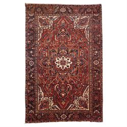 North West Persian Heriz/Ahar hand-knotted carpet, brick red field with a central bold ste...