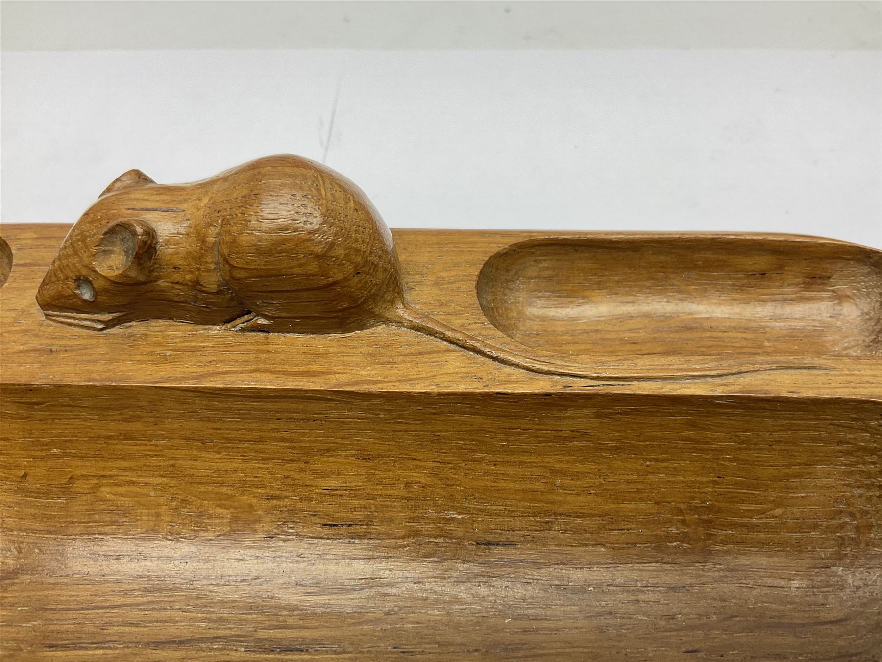 Mouseman - oak pen tray, rectangular form with rounded ends, carved mouse signature over penny moulded edge, by the workshop of Robert Thompson, Kilburn