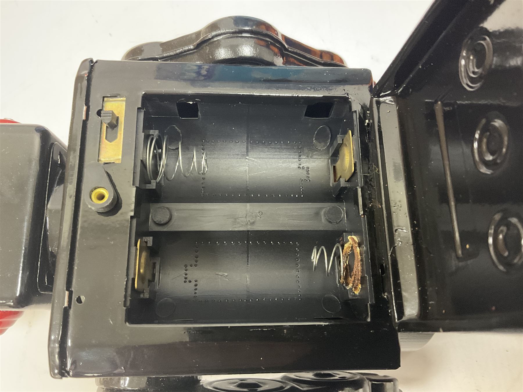 Three vintage battery operated robots comprising tin-plate Space Walk Man ME 100 Robot, Saturn the 13