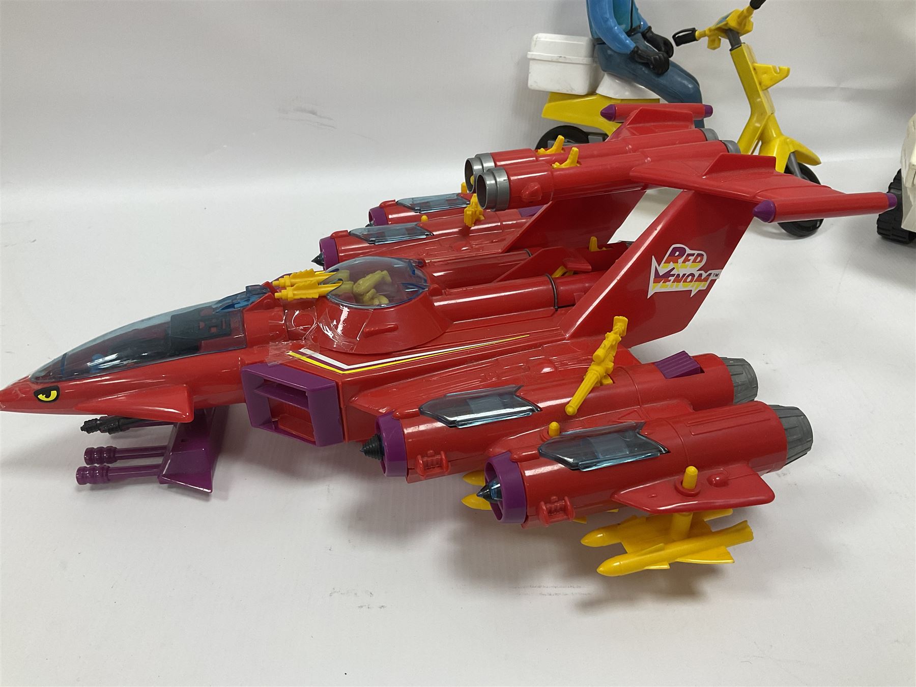 Manta Force Red Venom 1987 Bluebird Toys PLC toy plane with associated figures, with three more toy vehicles and figures comprising Lanard 1996 S.T.A.R Force Mobile Ground Support truck, Hasbro 2000 Action Man motorbike with side car, Sindy moped 
