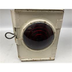 White painted railway lamp, the hinged door with red bullseye glass lens, with tall swing carrying handle, H52cm incl handle