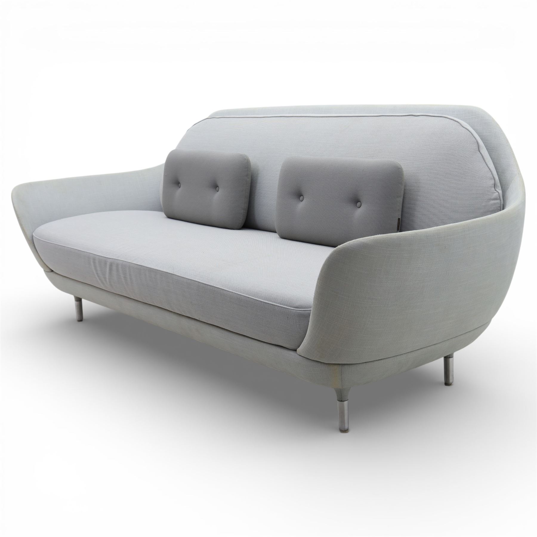 Fritz Hansen - 'Favn' sofa, designed by Jaime Hayon (1974-), upholstered in light grey fabric, the organic curved back and integrated arms enclosing loose seat and back cushions, raised on slender cylindrical metal supports