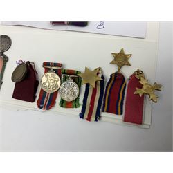 Eleven medal miniatures including Turkish Crimea, OBE (Civil), WW2 Burma Star and France/Germany Star, two pairs of WW2 War/Defence medals, LSGC etc; and two military badges
