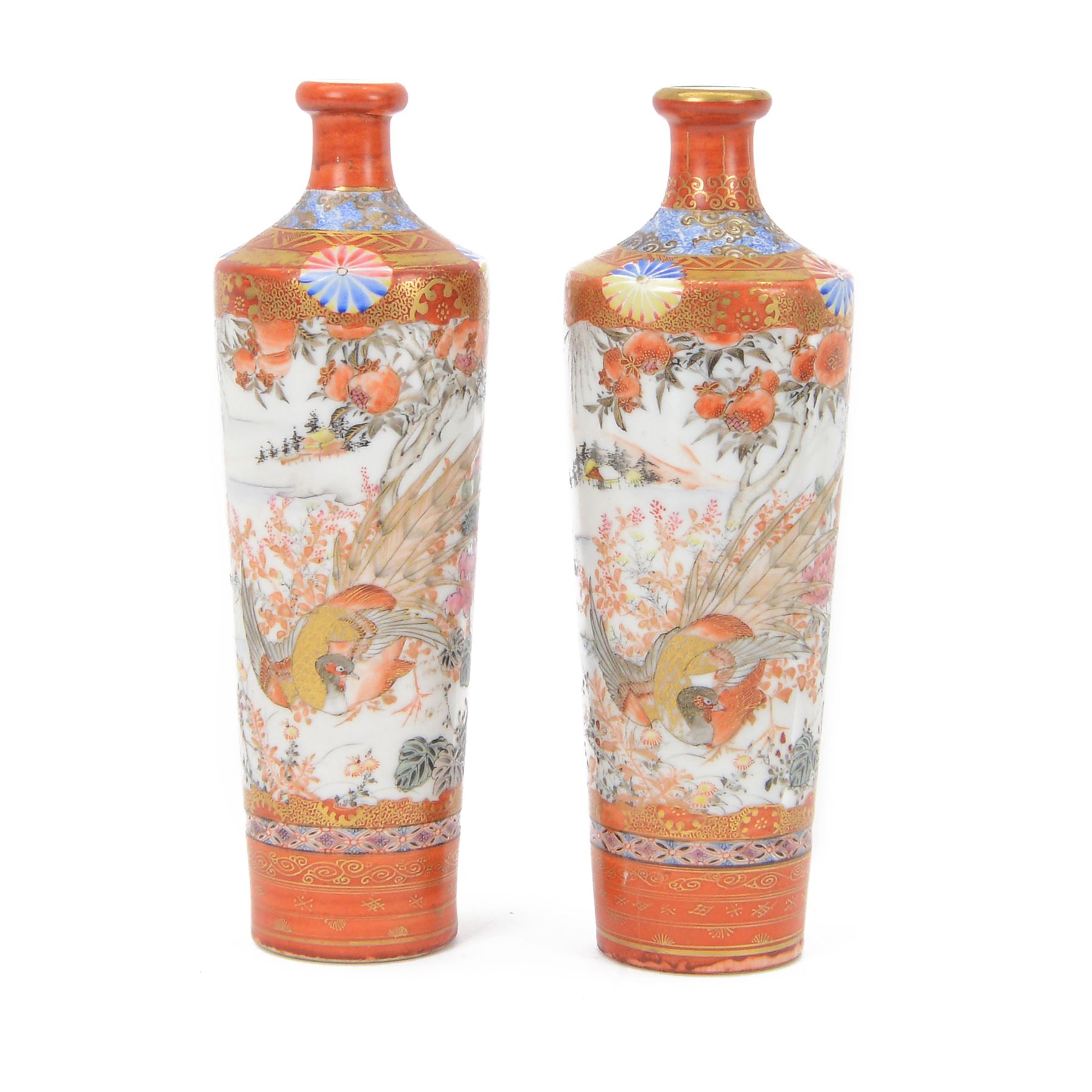 Pair of Japanese Meiji period Kutani vases of slender tapering form, decorated with a bird amongst flowers and trees, each with character marks beneath, H22cm 