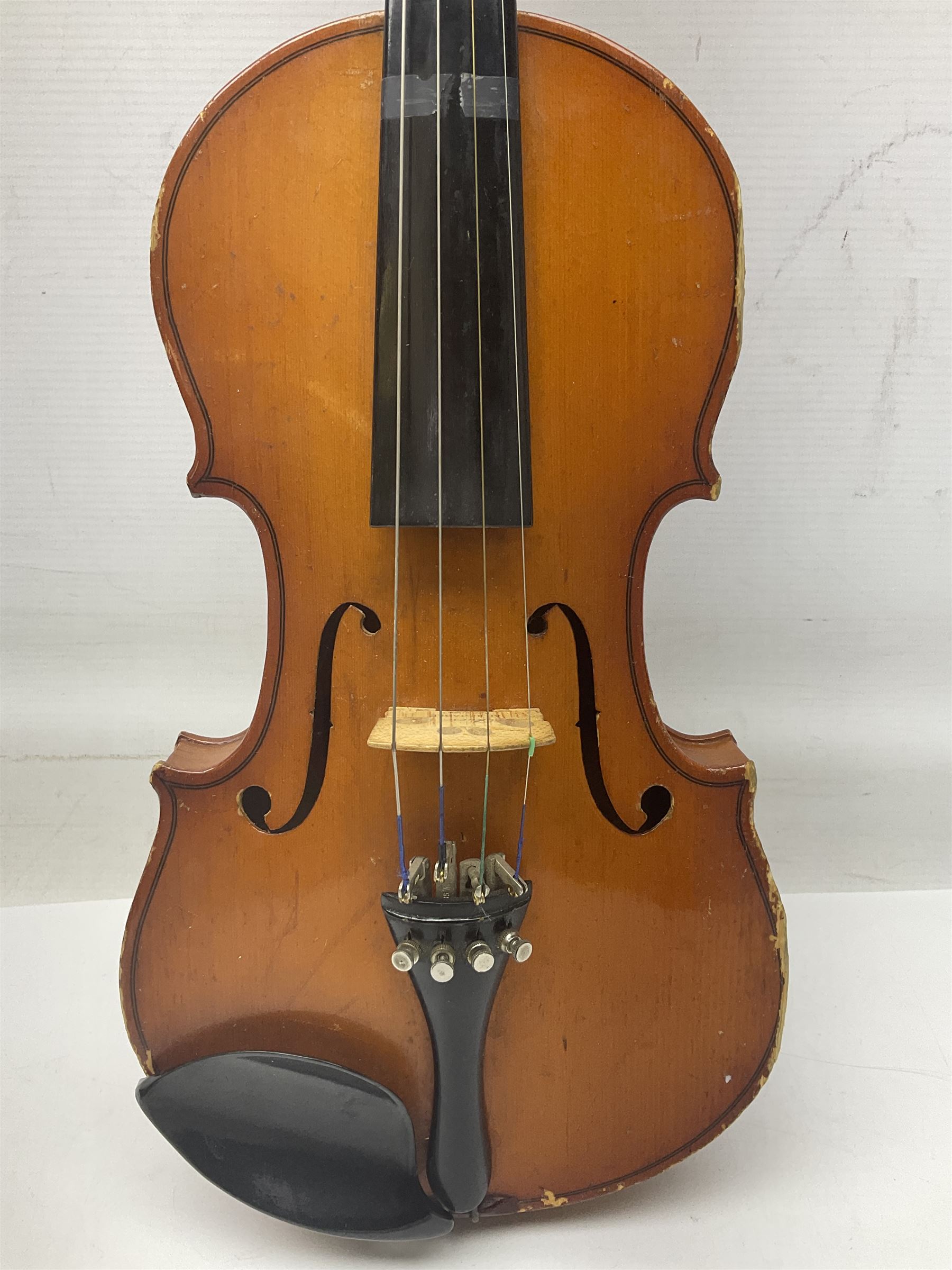 Four Chinese graduated violins - full size with 35.5cm two-piece back; three-quarter size with 33.5cm two-piece back; half size with 31cm two-piece back; and quarter size with 27.5cm two-piece back; all cased except full size; one with bow (4)