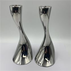 Pair of Georg Jensen chrome 'Cobra' candlesticks, with stamped maker's mark to base, H20cm