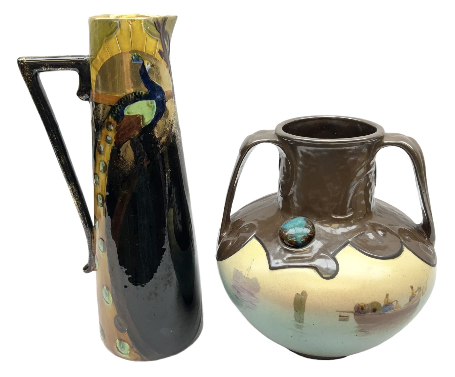 T. Forester Phoenix ware ewer of tapering form decorated with peacock and Bretby twin handled vase decorated with figures fishing in a boat sea scene