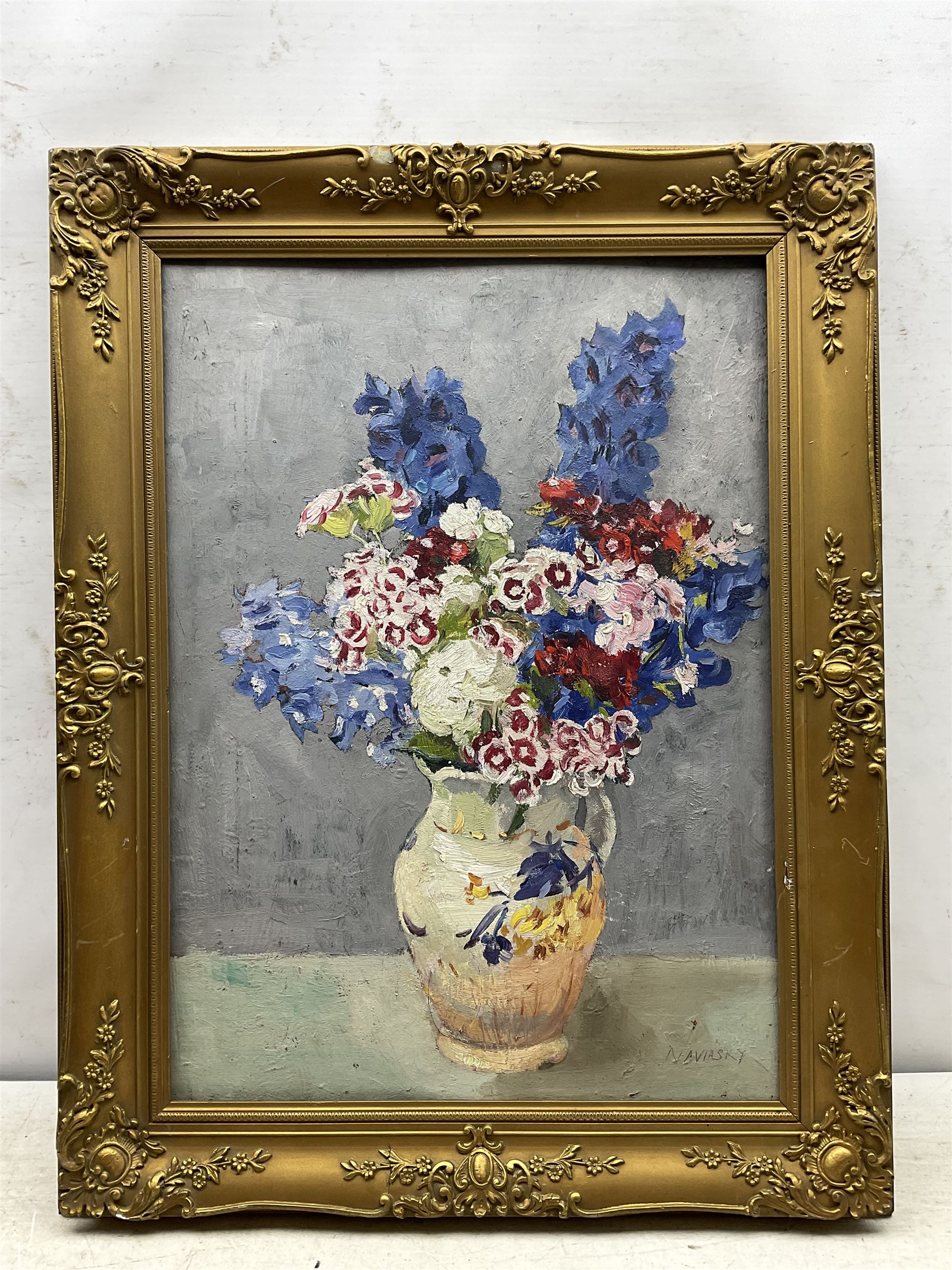 Philip Naviasky (Northern British 1894-1983): Still Life of Flowers in a Vase (recto) and Portrait of a Girl with a Bow in Her Hair (verso), two oils on board painted recto and verso, the former signed in pen 56cm x 41cm