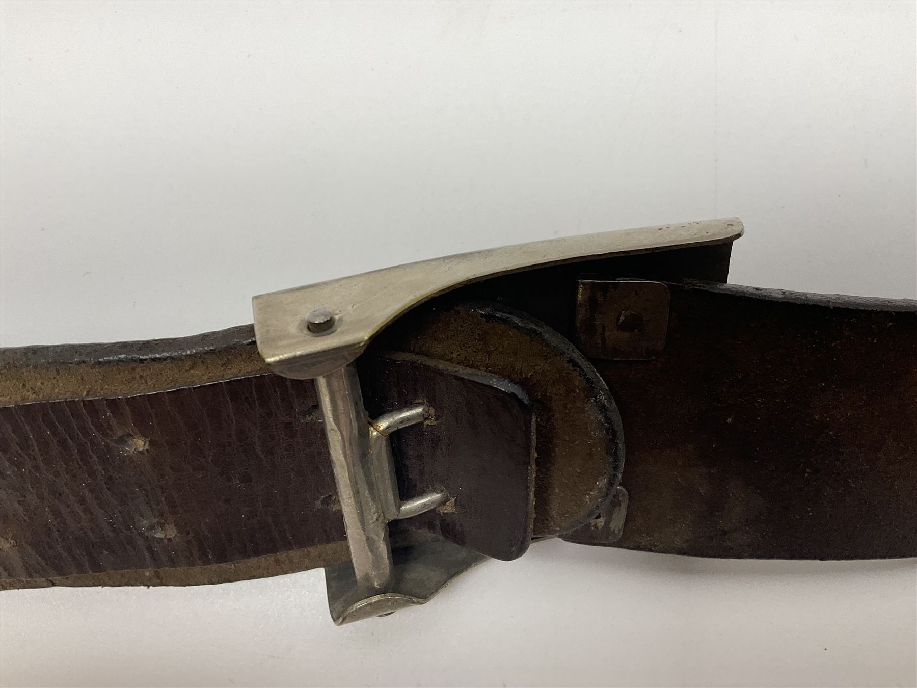 Pair of WW2 German Other Ranks trousers c1940-42, stamped C.& A. Brenninkmeyer Workstatten; WW2 German Army webbing belt with steel 'Gott Mit Uns' buckle; and WW2 German leather belt with 'Stahlhelm' (Steel Helmet League) members buckle (3)